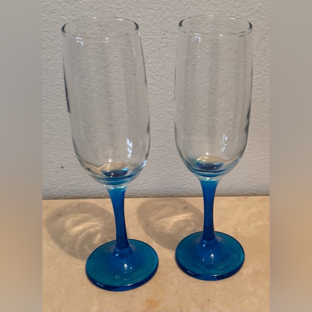 2 Epure blue glass flutes. 8.25”